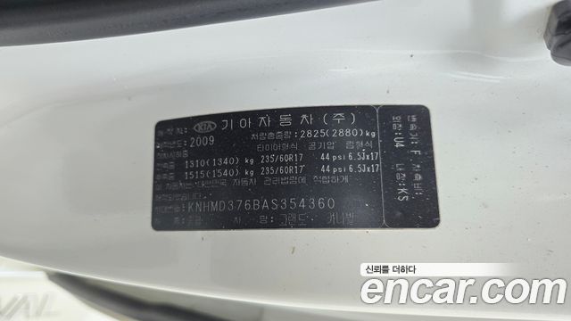 Kia Canival 2010 — photo 31