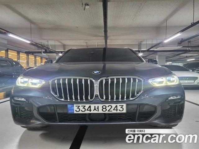 BMW X5 2021 — photo 1