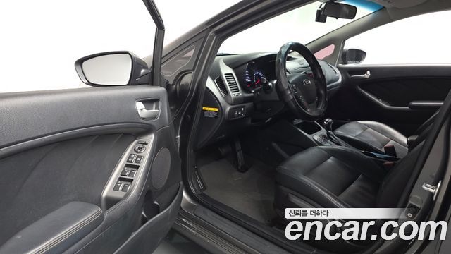 Kia K3 2013 — photo 10