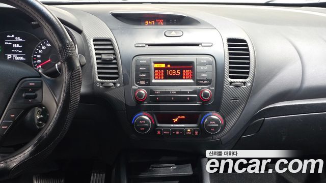 Kia K3 2013 — photo 13