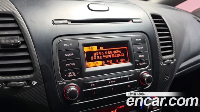 Kia K3 2013 — photo 14