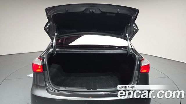 Kia K3 2013 — photo 20