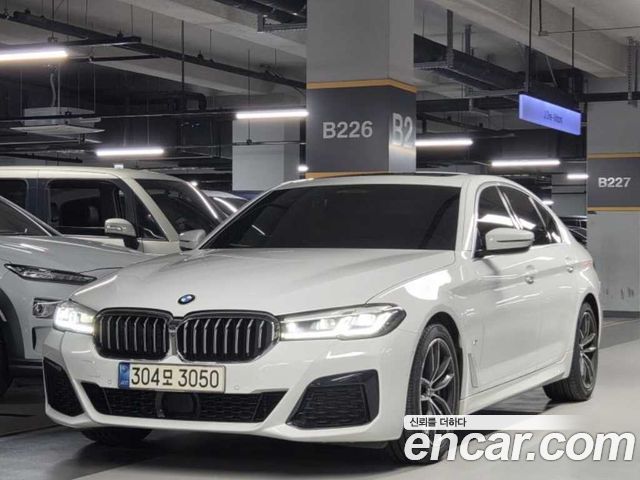 BMW 5-Series 2021 — photo 1