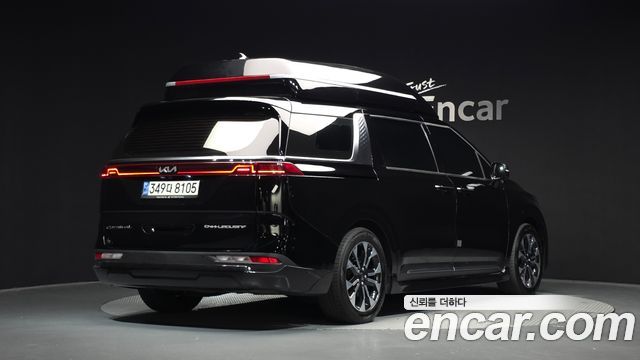 Kia Canival 2021 — photo 2