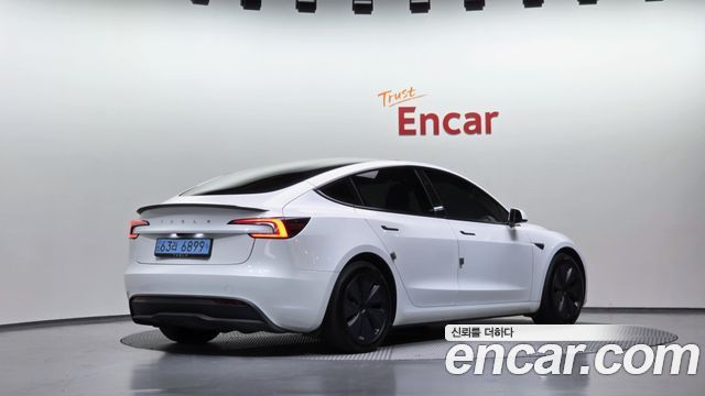 Tesla Model 3 2024 — photo 2