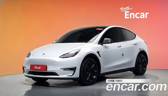 Tesla Model Y 2021 — photo 1