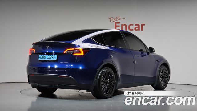 Tesla Model Y 2022 — photo 2