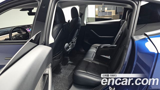 Tesla Model Y 2022 — photo 16