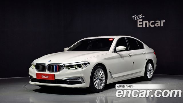 BMW 5-Series 2018 — photo 1