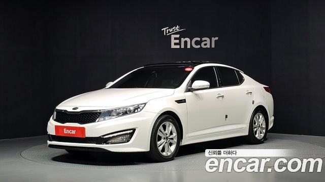 Kia K5 2011 — photo 1