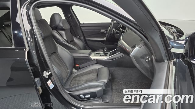 BMW 3-Series 2022 — photo 16