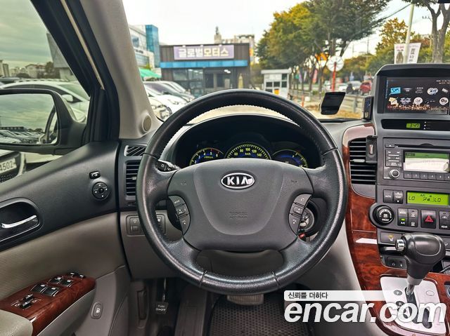 Kia Canival 2010 — photo 13