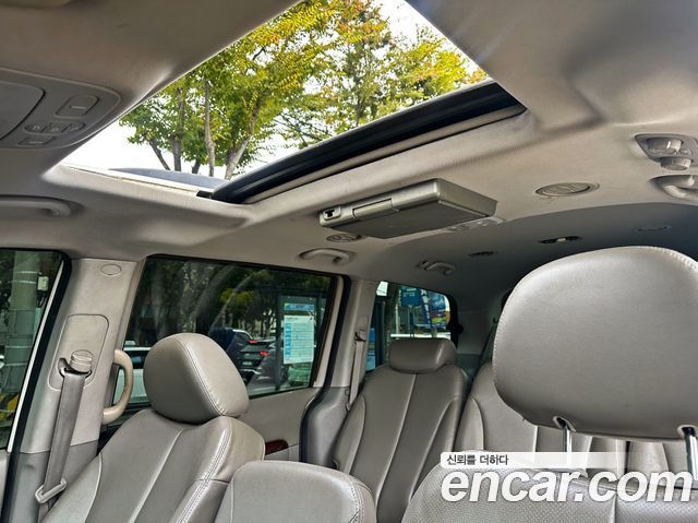Kia Canival 2010 — photo 15