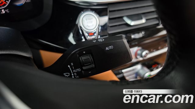 BMW 5-Series 2022 — photo 28