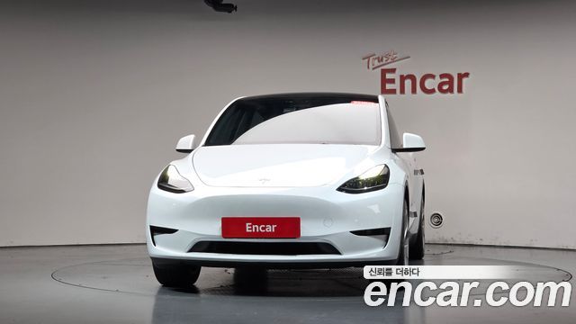 Tesla Model Y 2024 — photo 3