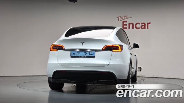 Tesla Model Y 2024 — photo 4