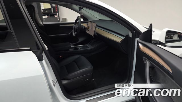 Tesla Model Y 2024 — photo 17