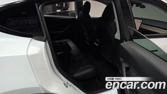 Tesla Model Y 2024 — photo 18