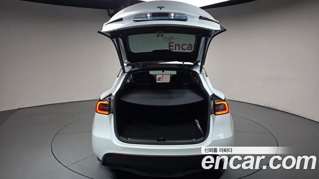 Tesla Model Y 2024 — photo 26