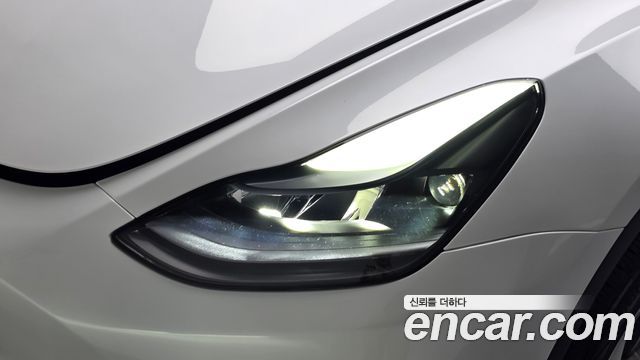 Tesla Model Y 2024 — photo 8
