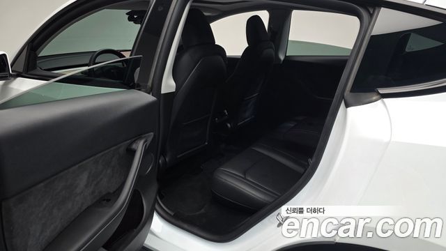 Tesla Model Y 2024 — photo 16