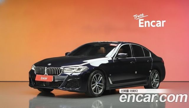 BMW 5-Series 2022 — photo 1
