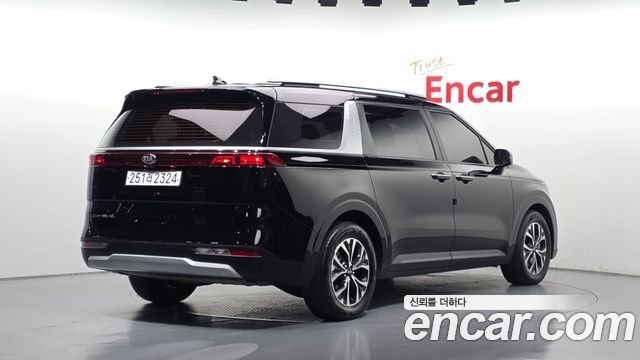 Kia Canival 2021 — photo 2