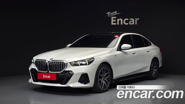 BMW 5-Series 2024 — photo 1