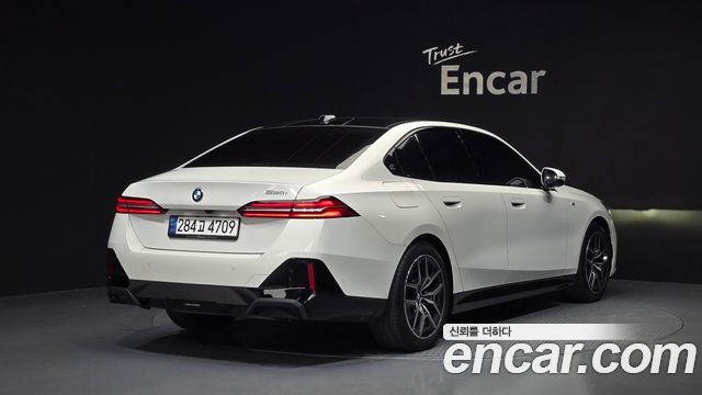BMW 5-Series 2024 — photo 2