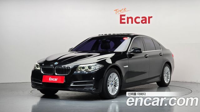 BMW 5-Series 2015 — photo 1