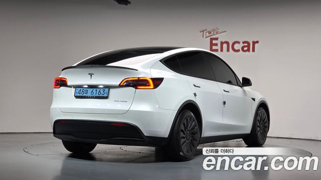 Tesla Model Y 2022 — photo 2