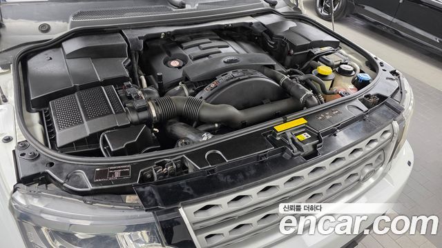 Land Rover Discovery 2014 — photo 6
