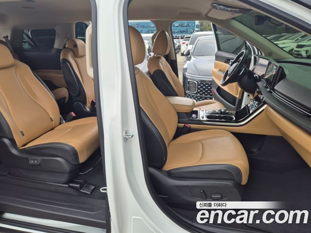 Kia Canival 2023 — photo 11