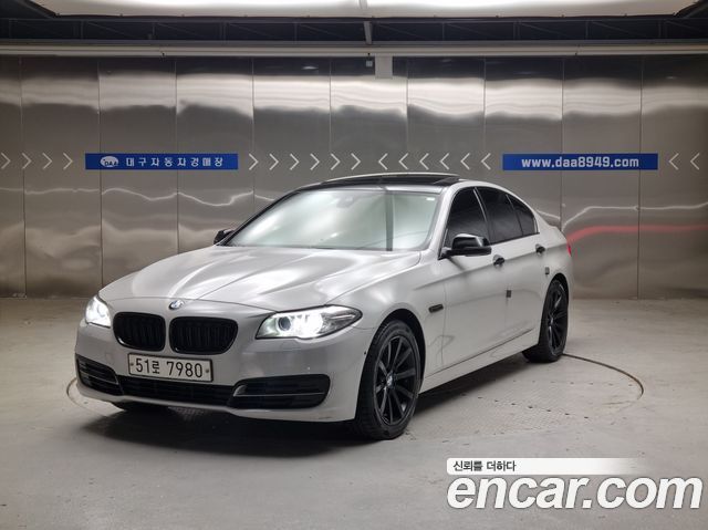 BMW 5-Series 2014 — photo 1