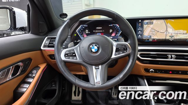BMW 3-Series 2023 — photo 19