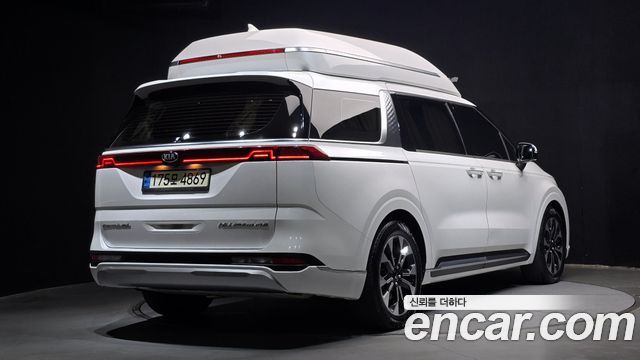 Kia Canival 2021 — photo 2