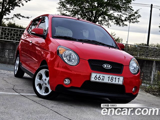 Kia morning 2010 — photo 1