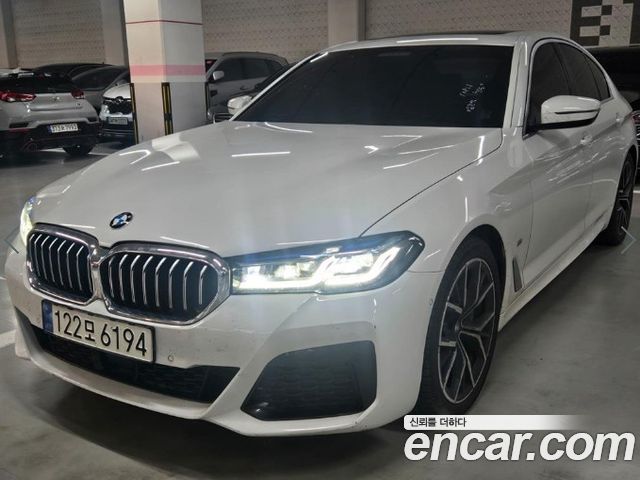 BMW 5-Series 2023 — photo 1