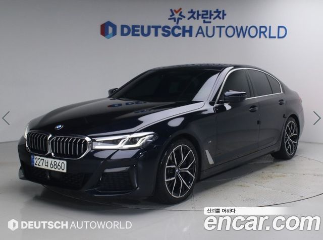 BMW 5-Series 2022 — photo 1
