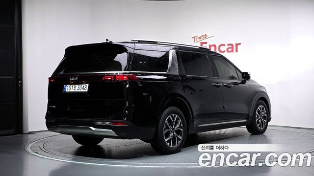 Kia Canival 2023 — photo 2
