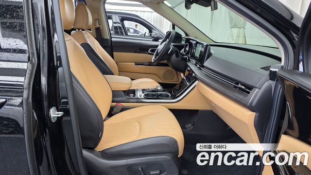 Kia Canival 2023 — photo 11