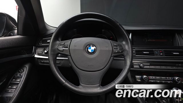 BMW 5-Series 2015 — photo 20