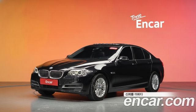 BMW 5-Series 2015 — photo 1