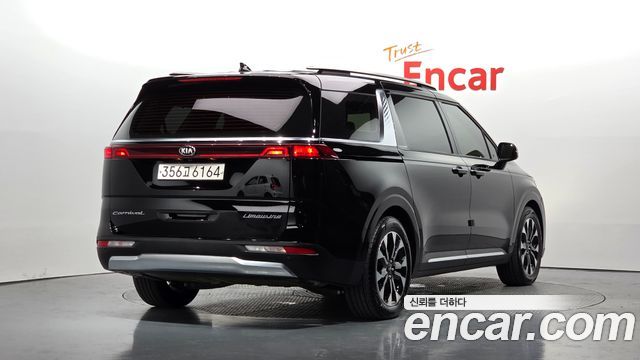 Kia Canival 2021 — photo 2