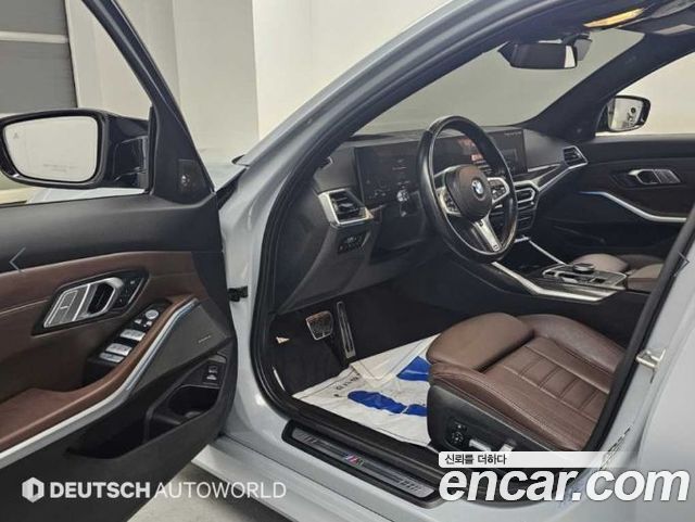 BMW 3-Series 2023 — photo 11
