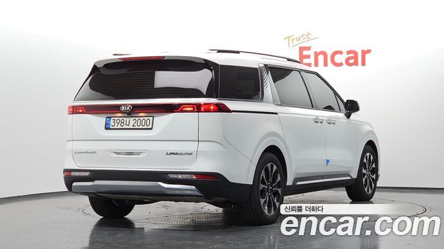 Kia Canival 2021 — photo 2