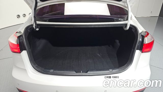 Kia K3 2014 — photo 29