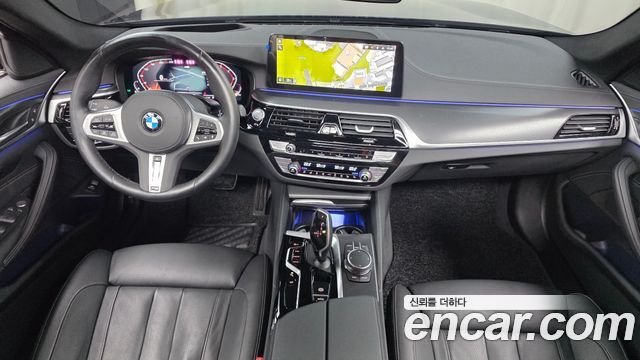 BMW 5-Series 2023 — photo 10