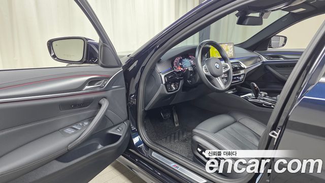 BMW 5-Series 2023 — photo 13