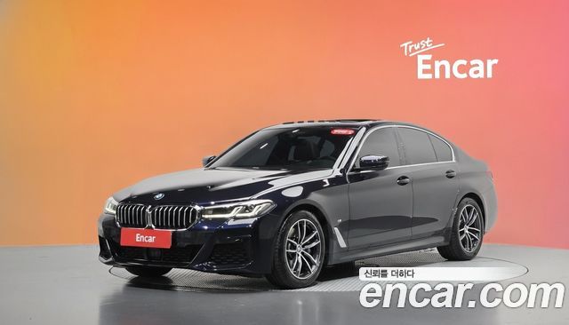 BMW 5-Series 2023 — photo 1